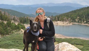 "Mikaela Ruland with her dog McKenzie at St. Mary's Glacier in Colorado"
